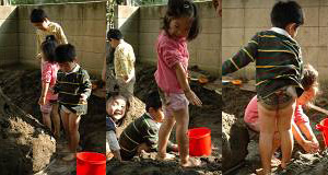 砂場で遊ぶ子供たち、泥だらけ